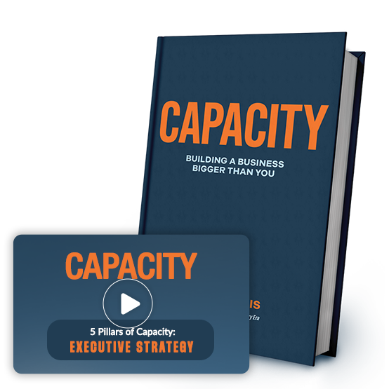 A book titled "Capacity: Building a Business Bigger Than You" stands upright next to a video thumbnail labeled "CAPACITY: 5 Pillars of Capacity: Executive Strategy.